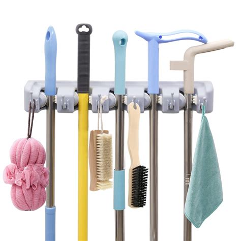 Holikme Mop Broom Holder Wall Mount Metal Pantry Organization and Storage Garden Kitchen Tool Organizer Wall Hanger for Home Goods (4 Positions with 4 Hooks, Silver) 22,915. 4K+ bought in past month. $999. List: $12.99. FREE delivery Fri, Dec 15 on $35 of items shipped by Amazon. Or fastest delivery Thu, Dec 14. 